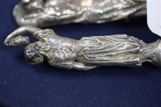 A pair of Victorian silver fish servers, with cast figural handles modelled as a fisherman and his wife, Francis Higgins III,